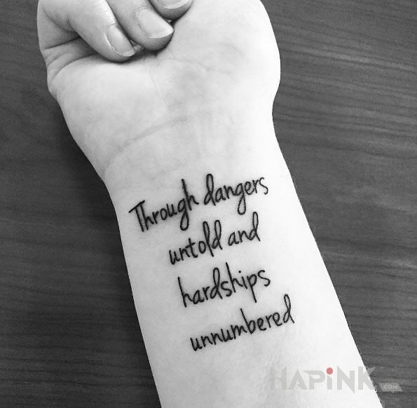 Tattoo Niebezpieczeństwa i trudności in lettering motif and calligraphy style On the arm