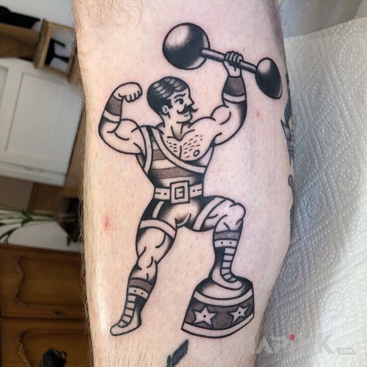 Tattoo Siłacz / Cyrk in characters motif and oldschool style on the forearm