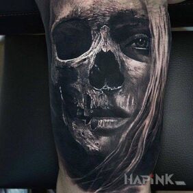 Tattoo Two faces on the upper arm motif: 3D style: realistic