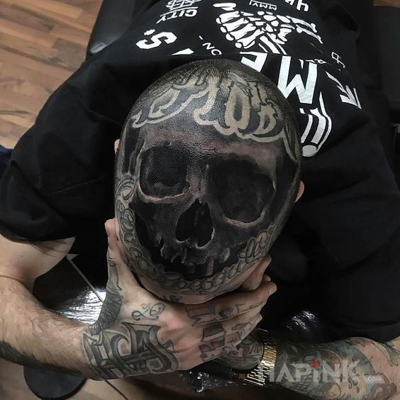 Tattoo Wytatuuj mi czaszkę na czaszce in black and gray motif and realistic style on the head