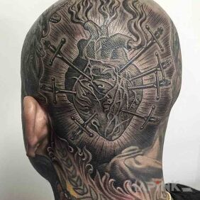 Tattoo Wounded heart on the head motif: anatomical style: realistic