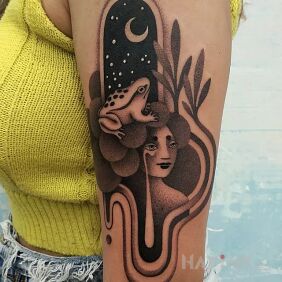 Tattoo Big tear from the eye on the upper arm motif: faces style: graphic / illustrative