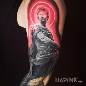 Tattoo Greek on the upper arm motif: characters style: realistic