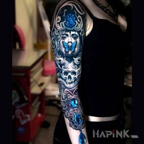 Tattoo Blue sleeve on the upper arm motif: faces