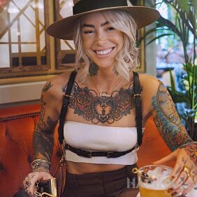 Tattoo Contagious smile On the arm motif: colorful style: graphic / illustrative