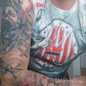 Tattoo POLISH 303 SQUADRON on the upper arm motif: faces style: realistic