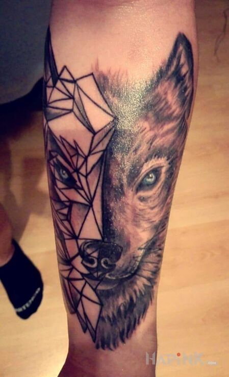 Tattoo Dwie twarze wilka in animals motif on the forearm