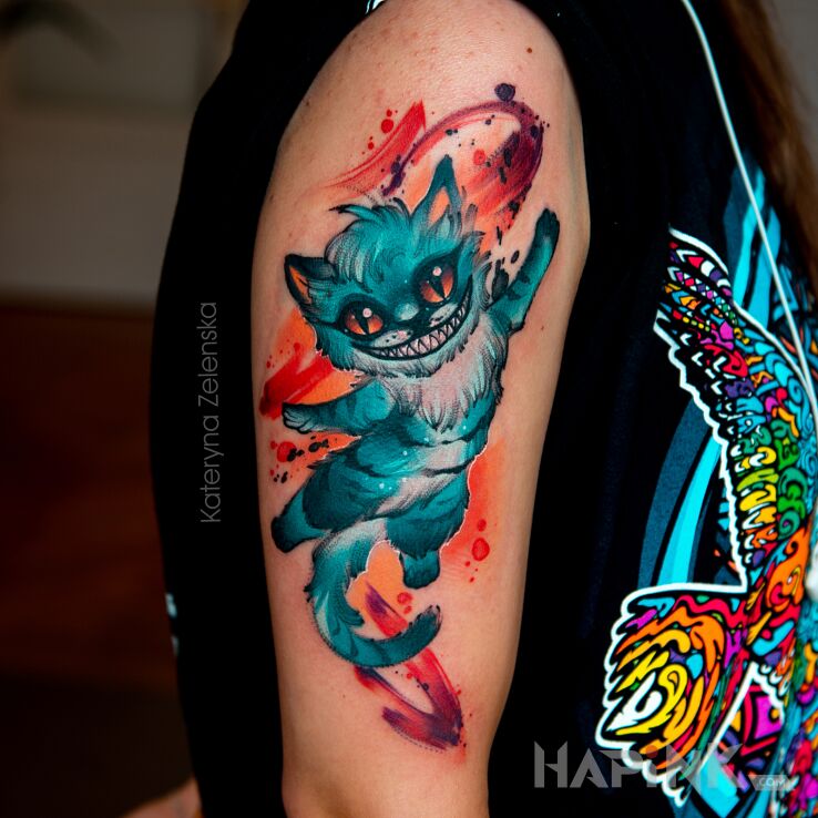 Tattoo Kot z Cheshire / Alicja w Krainie Czarów in colorful motif and Watercolor style On the arm