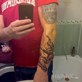 Tattoo Snake in the roses on the forearm motif: animals