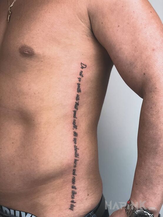 Tattoo Niedużych rozmiarów czcionka in lettering motif and calligraphy style on the ribs