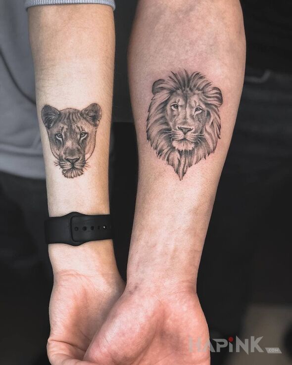 Tattoo Lion family in animals motif and realistic style on the forearm