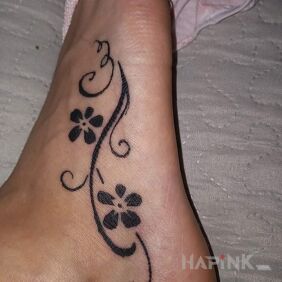 Tattoo Syrka after healing :) on the foot motif: flowers style: contour / linework