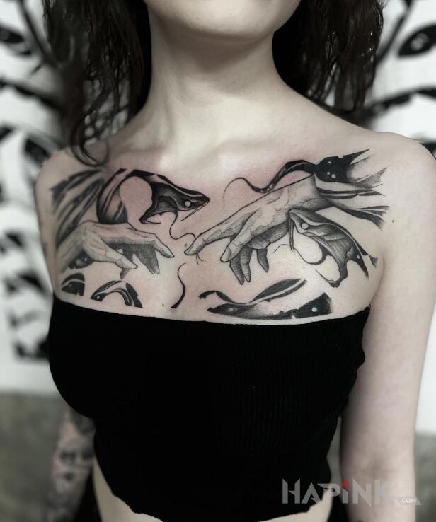 Tattoo Stworzenie Adama w interpretacji Licho in black and gray motif and graphic / illustrative style on the collarbone