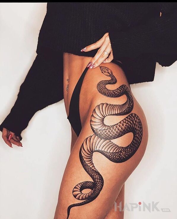 Tattoo Wężowy klimat in black and gray motif and graphic / illustrative style on the leg
