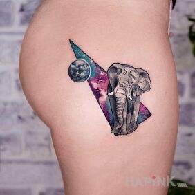 Tattoo Slon in space on the leg motif: cosmos