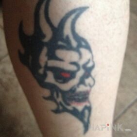 Tattoo Soul on the leg motif: demons