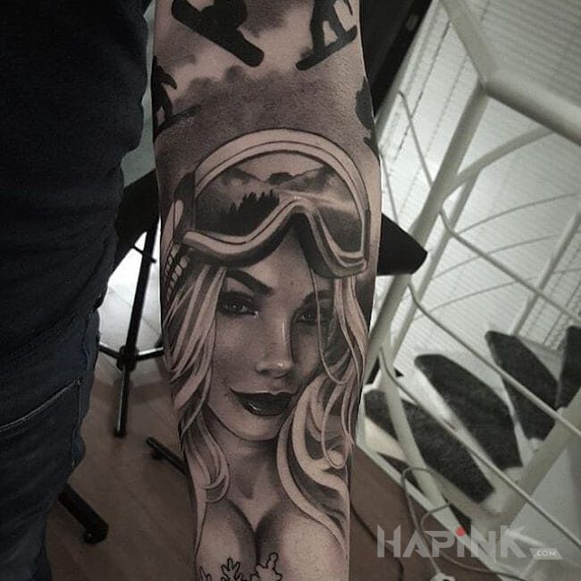 Tattoo Snowboard in sexy motif on the forearm