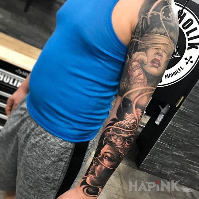 Tattoo Rekaw in sleeves motif and realistic style on the forearm
