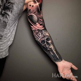 Tattoo Cosmic Pharaoh On the arm motif: black and gray style: realistic