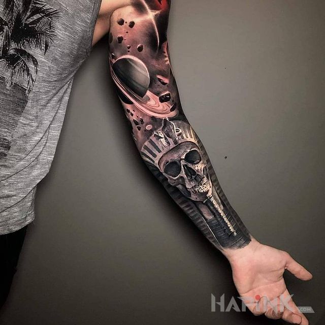 Tattoo Kosmiczny faraon in cosmos motif and realistic style on the forearm