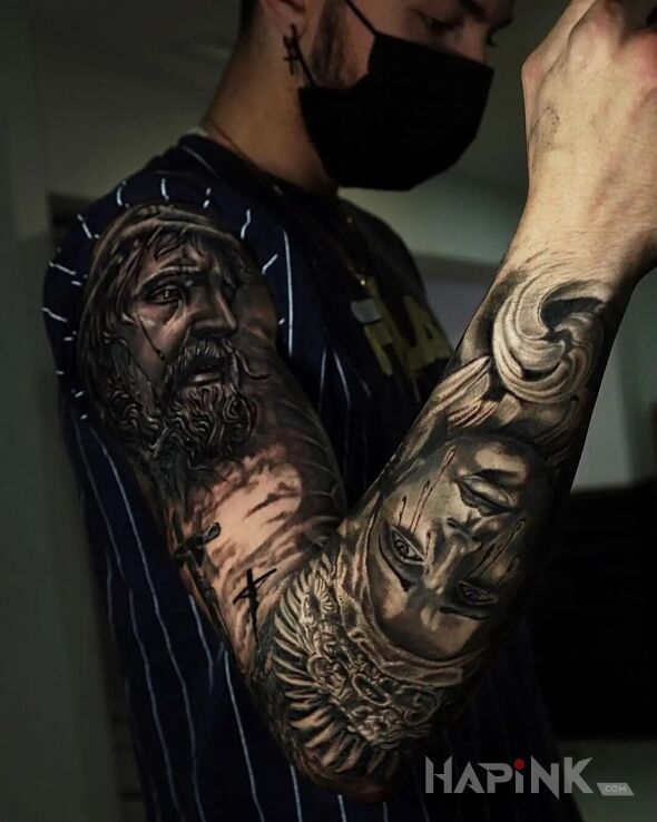 Tattoo Cierpienie na Golgocie in religious motif and realistic style on the forearm