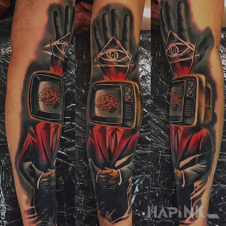Tattoo New World Order in characters motif and realistic style on the forearm