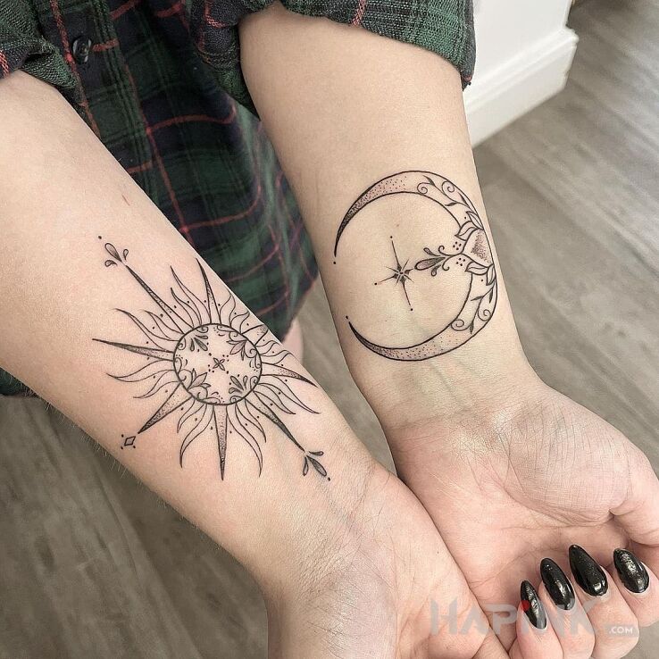 Tattoo Słońce / księżyc in black and gray motif and graphic / illustrative style on the forearm