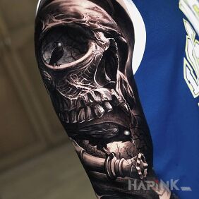 Tattoo Two ravens by a skull on the upper arm motif: animals style: realistic