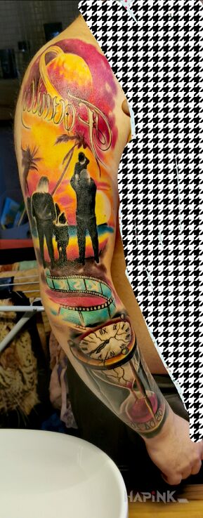 Tattoo Nowy in colorful motif and realistic style on the upper arm
