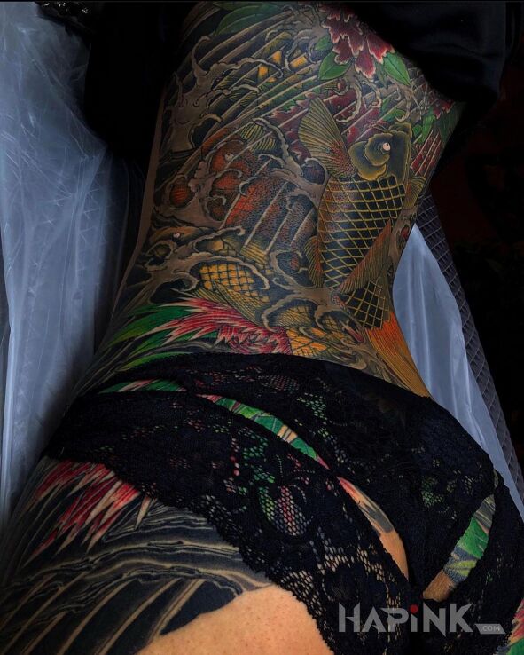 Tattoo Złota rybka in colorful motif and japanese / irezumi style on the buttocks