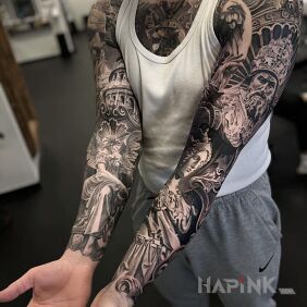 Tattoo Two paws in tattoos on the upper arm motif: faces style: realistic