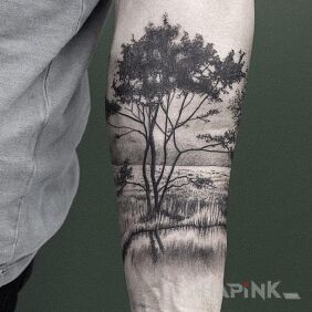 Tattoo Tree on the forearm style: realistic