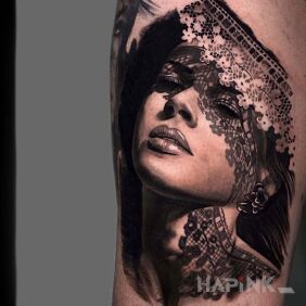 Tattoo Girl behind the curtain On the arm motif: faces style: realistic