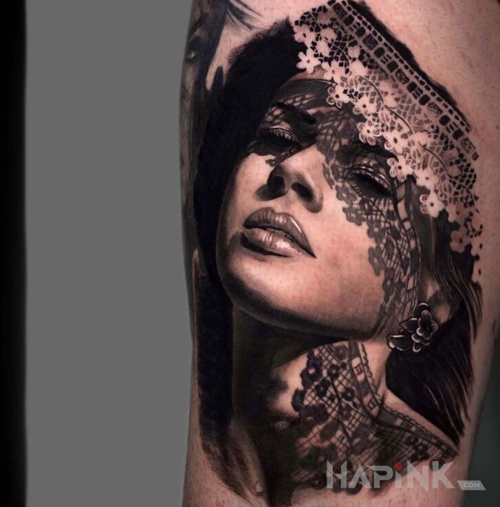 Tattoo Dziewczyna zza firany in 3D motif and realistic style on the bicep