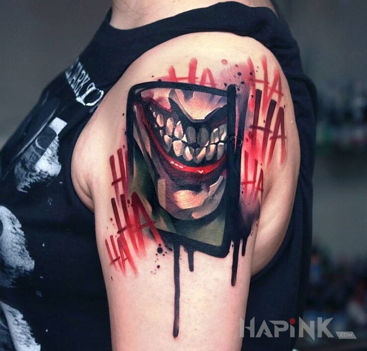 Tattoo Zabojczy zart in lettering motif on the upper arm