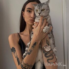 Tattoo Kitty on the forearm motif: objects style: graphic / illustrative