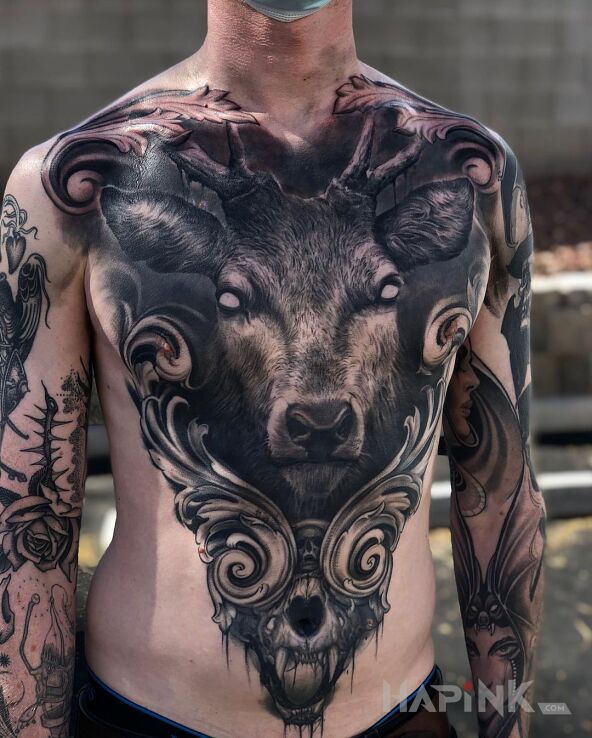 Tattoo Jelon in black and gray motif and realistic style on the stomach