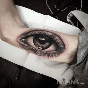 Tattoo Realistic eye on the upper arm motif: 3D style: realistic