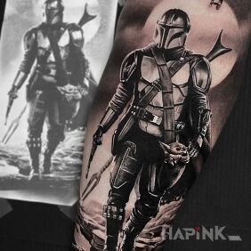 Tattoo Mando On the arm motif: black and gray style: realistic