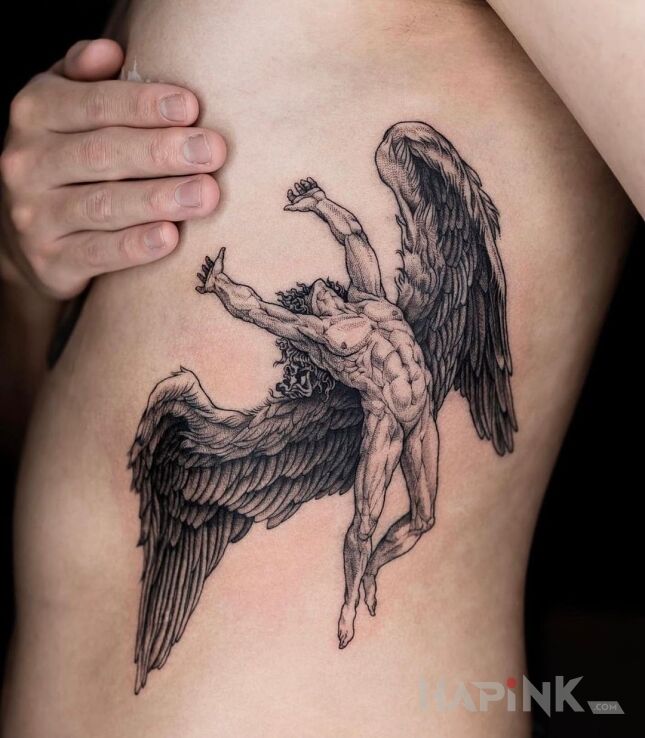Tattoo Umięśniony anioł in black and gray motif and graphic / illustrative style on the ribs