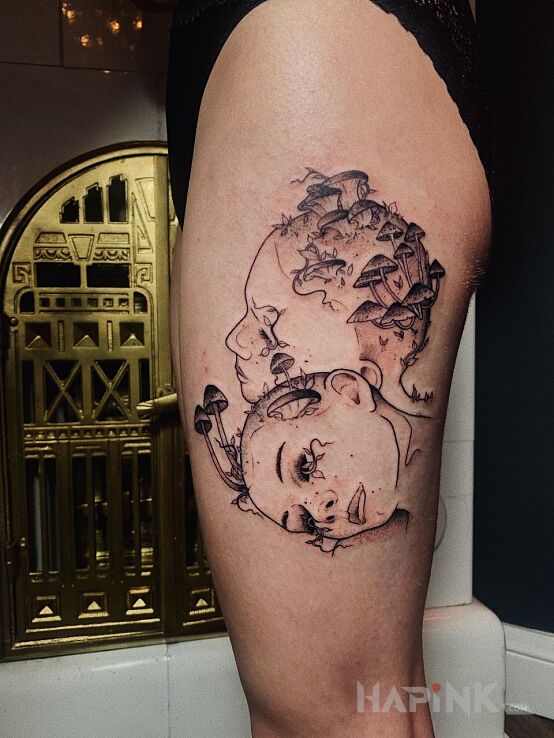 Tattoo Grzybki in black and gray motif and abstract style on the leg