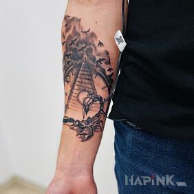 Tattoo Pyramid On the arm motif: black and gray style: realistic