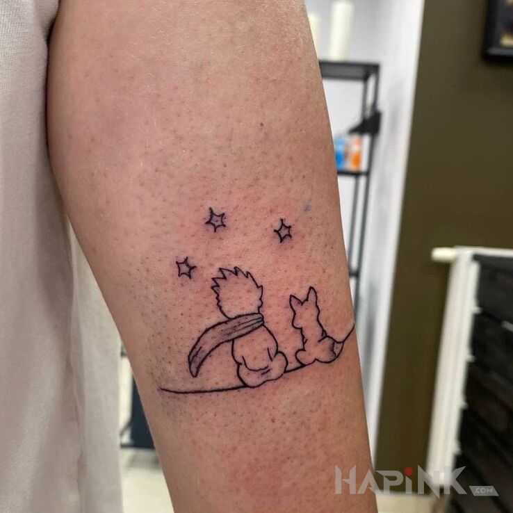 Tattoo Chłopiec i pies in characters motif and minimalistic style On the arm