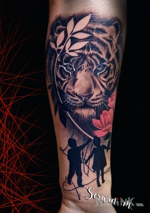 Tattoo Tygrys in animals motif and realistic style on the forearm