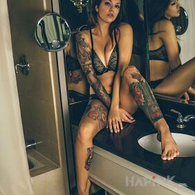 Tattoo At the Washbasin on the tibia motif: colorful style: realistic