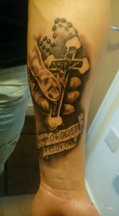 Tattoo Ku Pamieci in lettering motif on the forearm