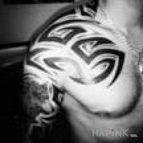 Tattoo Tribal wolf on the chest motif: animals style: tribal
