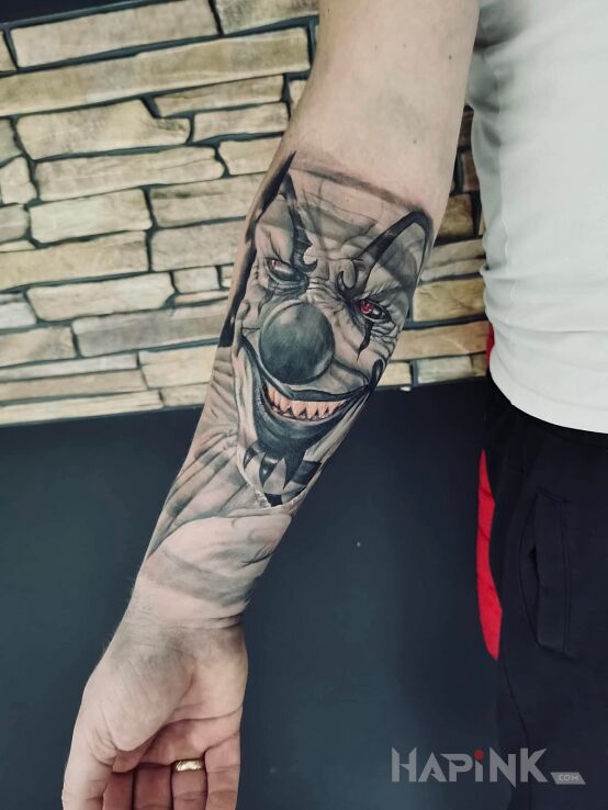 Tattoo Początek rękawa in dark motif and realistic style on the forearm
