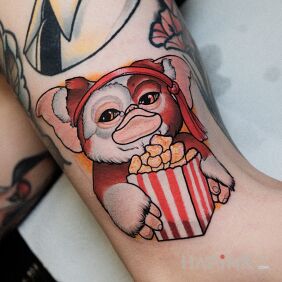 Tattoo Gizmo / Gremlins on the leg motif: colorful style: neo-traditional