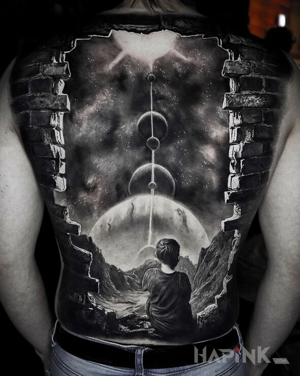 Tattoo Za murem widać więcej in black and gray motif and realistic style on the back